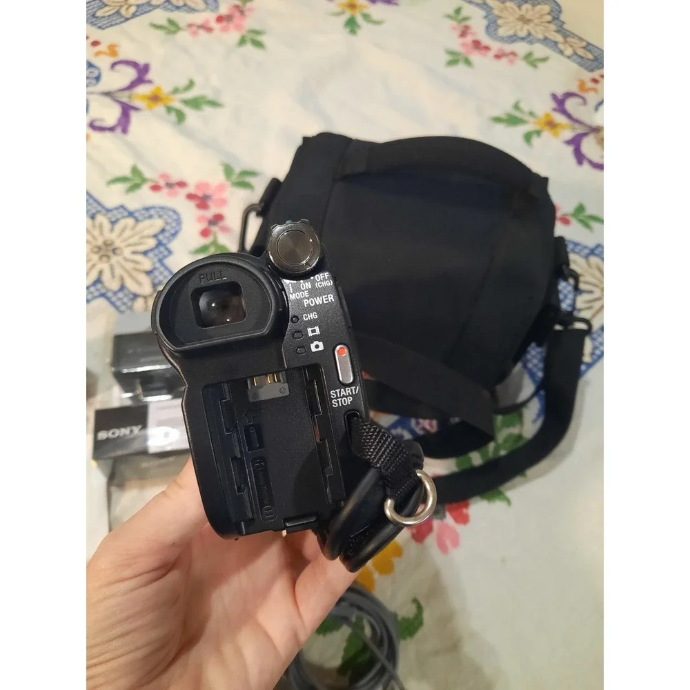 Sony Handycam DCR-DVD650 Camcorder 60x Zoom Bundle with New NP-FV100 Battery